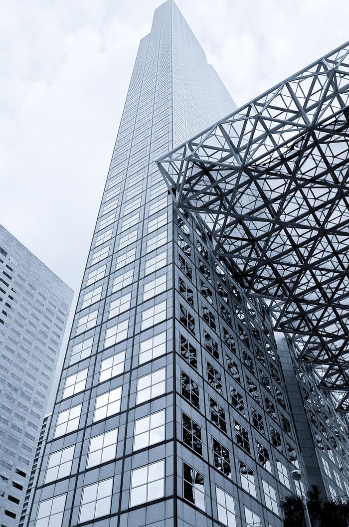 Tall, sleek skyscraper showcasing modern architecture in Miami Beach's business district.